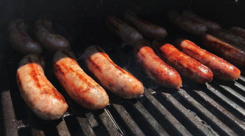 Keep the grill temperature around 300 degrees and turn brats every few minutes to prevent splitting and maximize browning.