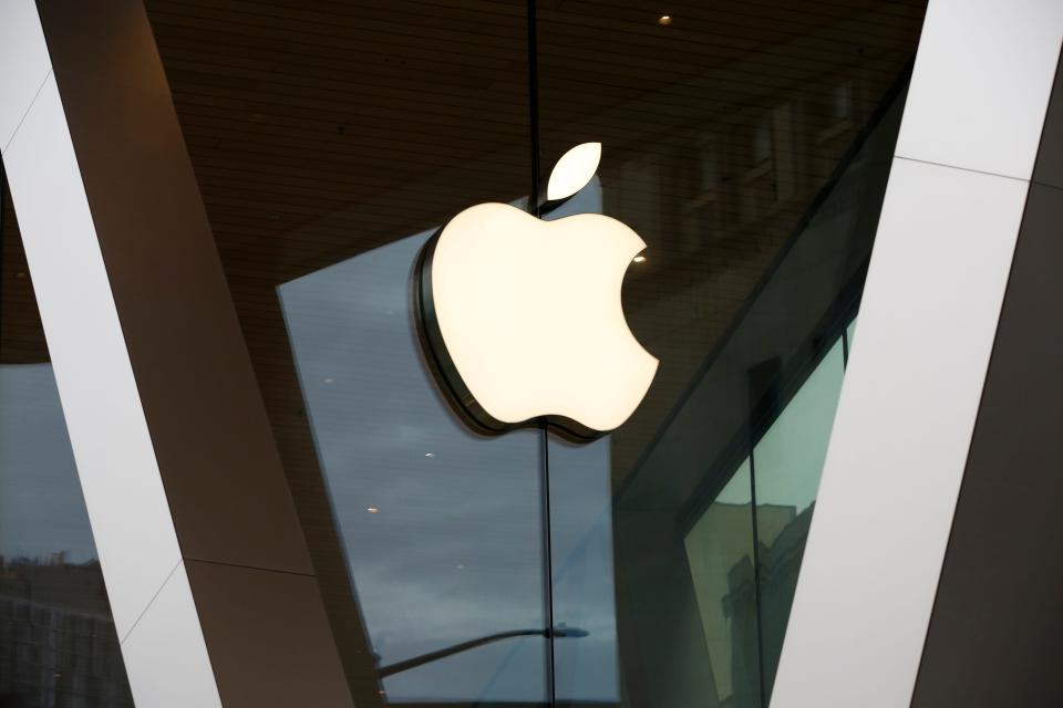 The Apple logo adorns the facade of the downtown Brooklyn Apple store in New York, March 14, 2020.