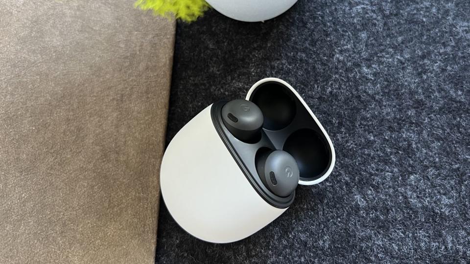 google pixel buds pro next to plant