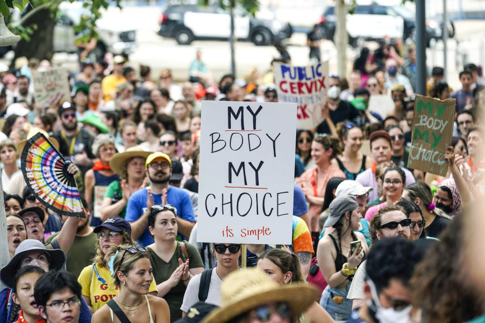 Image: Demonstrators gather near the federal courthouse to protest the news that the U.S. Supreme Court could be poised to overturn the landmark Roe v. Wade case that legalized abortion nationwide on May 3, 2022, in Austin, Texas. (Eric Gay / AP)