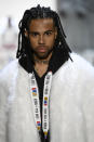 <p>Rapper Vic Mensa’s faux locs made a huge statement on the runway. (Photo: Getty Images) </p>