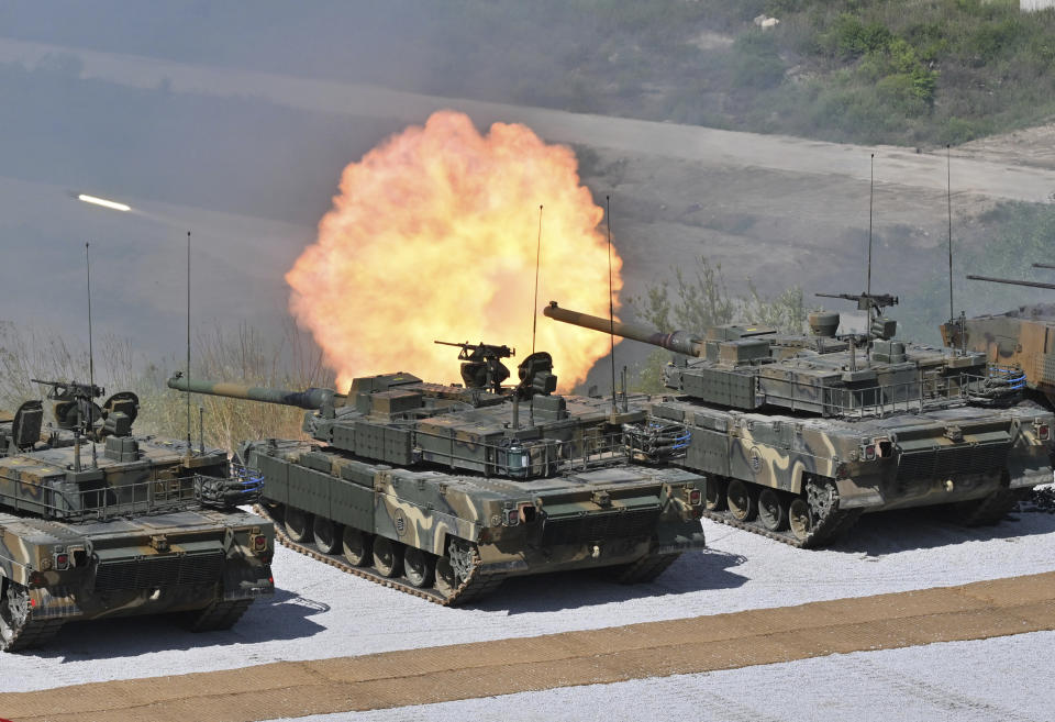 South Korea's K-2 tanks fire during a South Korea-U.S. joint military drill at Seungjin Fire Training Field in Pocheon, South Korea Thursday, June 15, 2023. (Jung Yeon-je/Pool Photo via AP)
