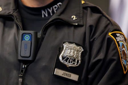 FILE PHOTO - A police body camera is seen on an officer during a news conference on the pilot program of body cameras involving 60 NYPD officers dubbed 'Big Brother' at the NYPD police academy in the Queens borough of New York, December 3, 2014. REUTERS/Shannon Stapleton/File Photo