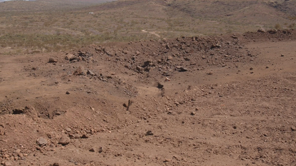 A flat pile of dirt where Juukan Gorge once stood. 