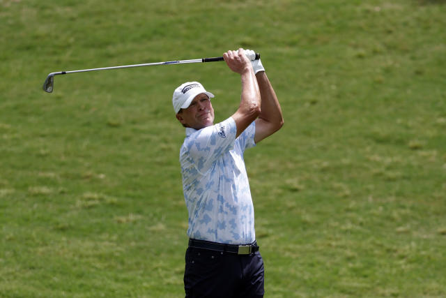 Steve Stricker hits an approach shot on the second hole during the final round of a Champions Tour golf tournament, Sunday, May 14, 2023, in Hoover, Ala. (AP Photo/Butch Dill)