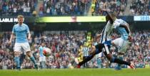 Football - Manchester City v Newcastle United - Barclays Premier League - Etihad Stadium - 3/10/15 Sergio Aguero scores the fifth goal for Manchester City Action Images via Reuters / Carl Recine