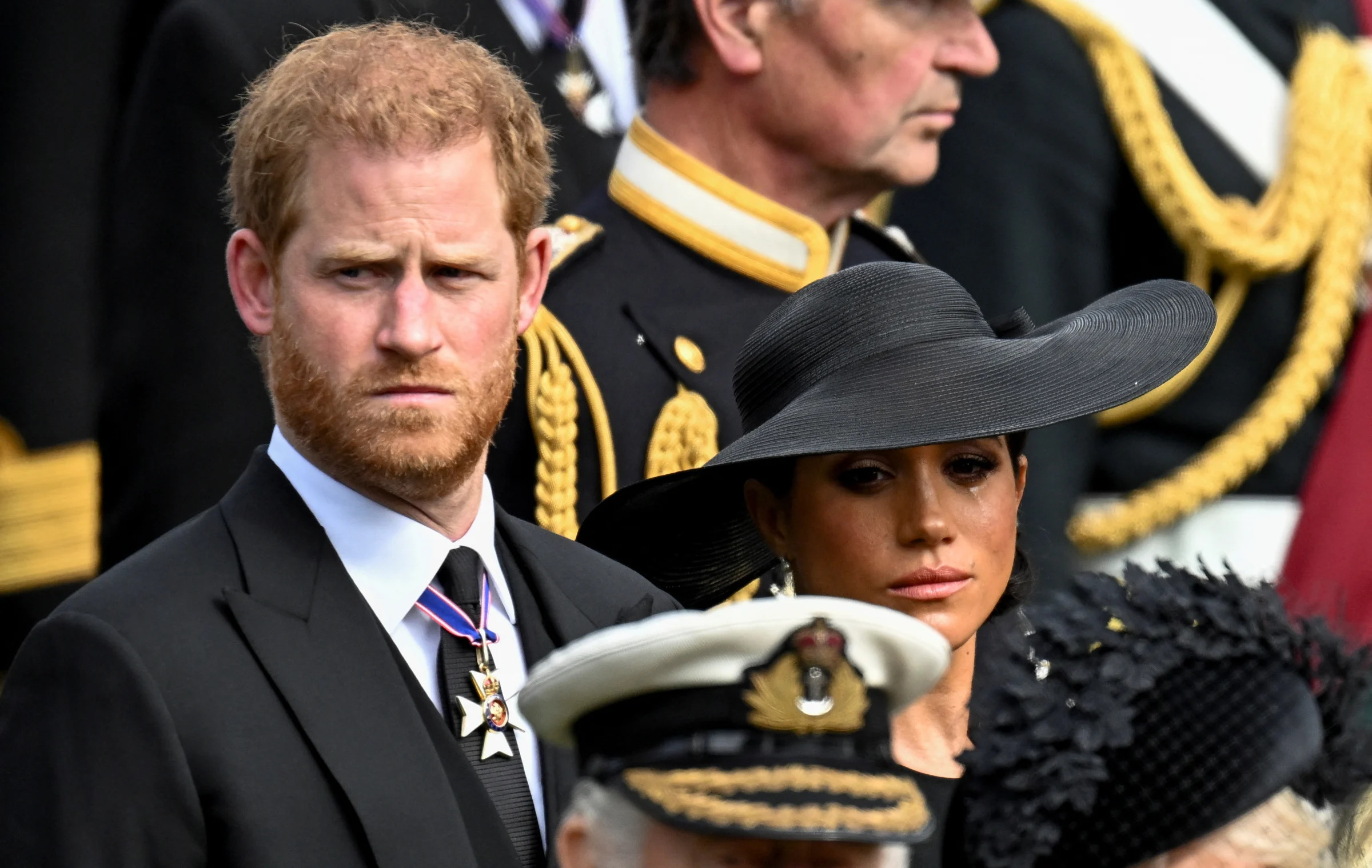 Britain's Meghan, Duchess of Sussex, reacts as she and Prince Harry, Duke of Sussex, attend the state funeral and burial of Britain's Queen Elizabeth, in London, Britain, September 19, 2022 REUTERS/Toby Melville