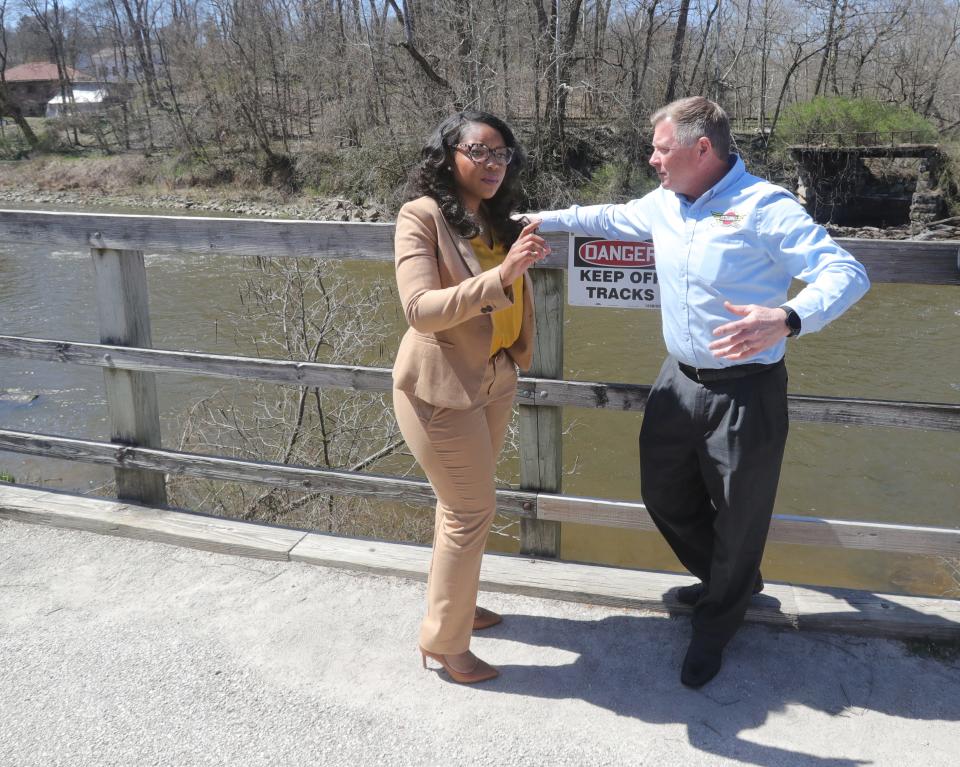 U.S. Rep. Emilia Sykes talks with Cuyahoga Valley Scenic Railroad President Joe Mazur on Monday in Peninsula.