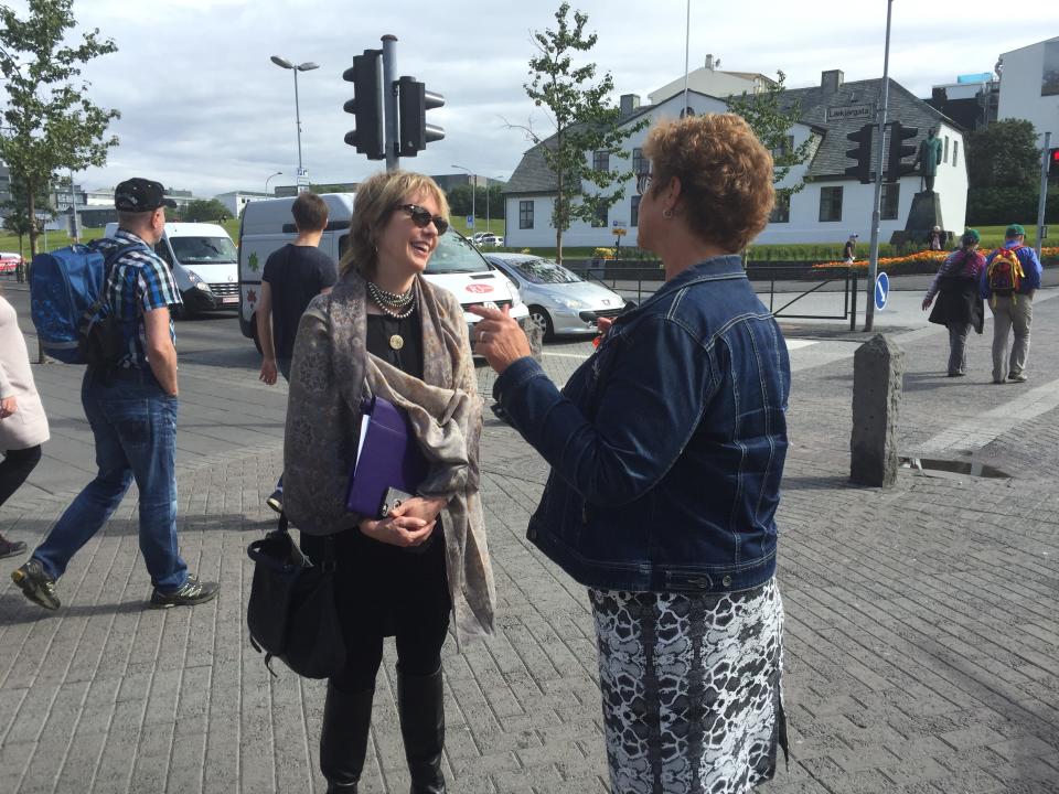 Director Pamela Hogan with activist Gudrun Jonsdottir, a participant in the film, standing in Reykjavik's Laekjartorg Square, where the demonstration on October 24, 1975 took place. 