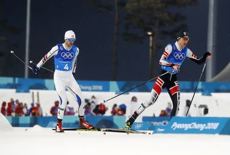 Nordic Combined Events - Pyeongchang 2018 Winter Olympics - Men's Team 4 x 5 km Final - Alpensia Cross-Country Skiing Centre - Pyeongchang, South Korea - February 22, 2018 - Mario Seidl of Austria competes with Joergen Graabak of Norway. REUTERS/Kai Pfaffenbach