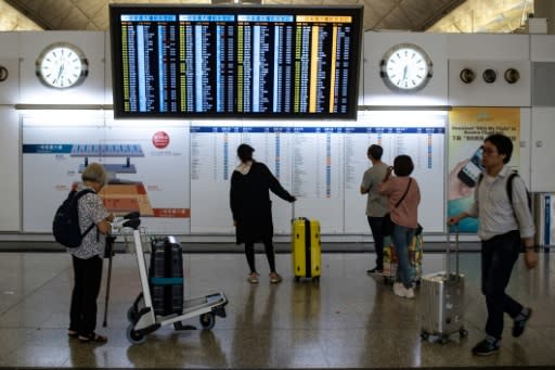 Flights were departing Hong Kong airport largely on schedule on Wednesday morning, a day after pro-democracy protesters caused chaos with a disruptive sit-in