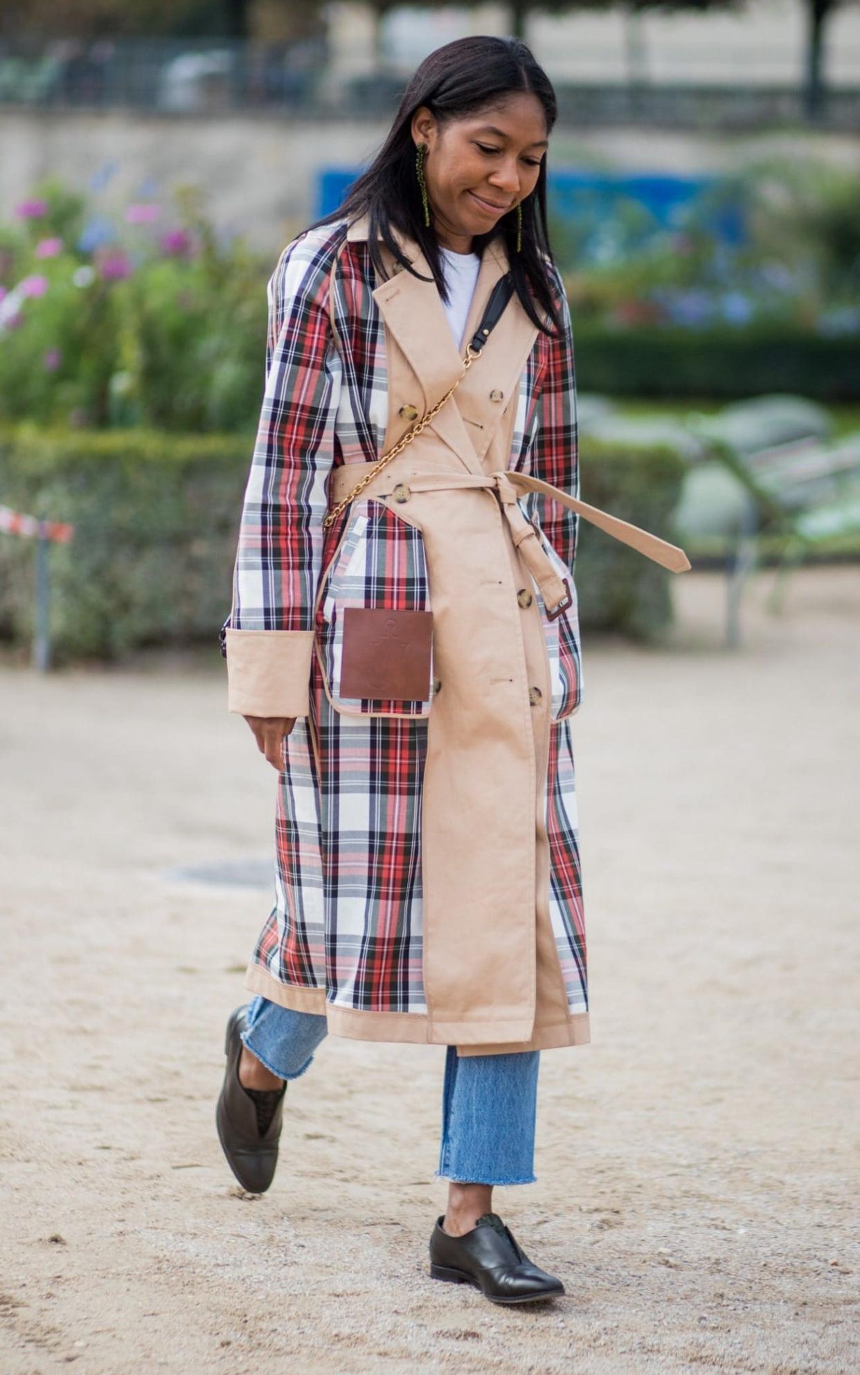 Kenya Hunt wears her tartan trench at Paris Fashion Week.  - Getty Images Europe