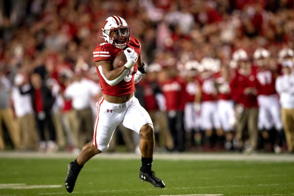 Wisconsin Badgers running back Braelon Allen scores a second-quarter touchdown against Army on Oct. 16, 2021, at Camp Randall Stadium. The game was the last one started under the lights at Camp Randall. However, Wisconsin could have two night games on NBC in 2023.