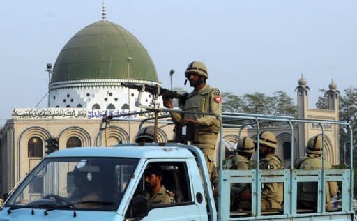 Pakistani paramilitary soldiers patrol in Lahore. Security has been increased throughout the country in the month of Moharram to avoid sectarian violence. It commemorates the death of Imam Hussain, the grandson of the Prophet Mohammed, along with his close relatives and supporters in the Battle of Karbala in modern-day Iraq in the year 680