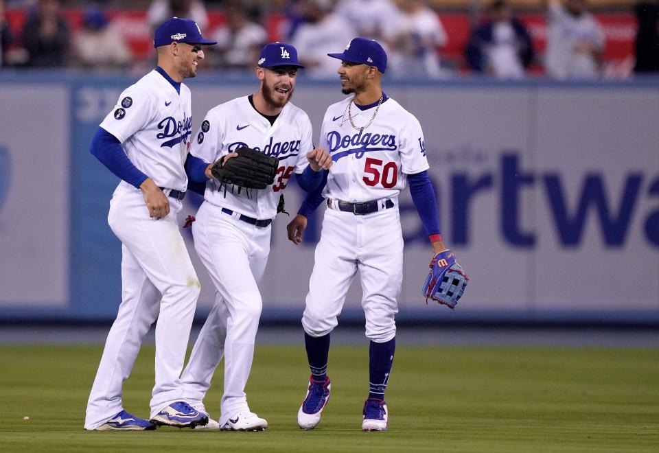Dodgers players celebrate their win in Game 1 against the Padres.