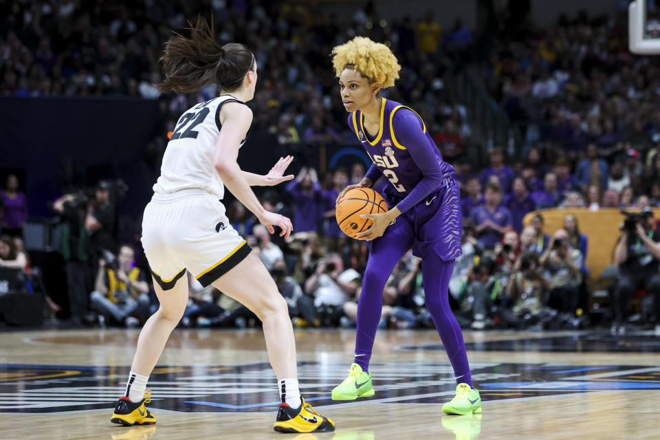 LSU guard Jasmine Carson drives to the basket against Iowa guard Caitlin Clark in the first half during the NCAA women's tournament national championship game at the American Airlines Center in Dallas on April 2, 2023. (Kevin Jairaj/USA TODAY Sports)