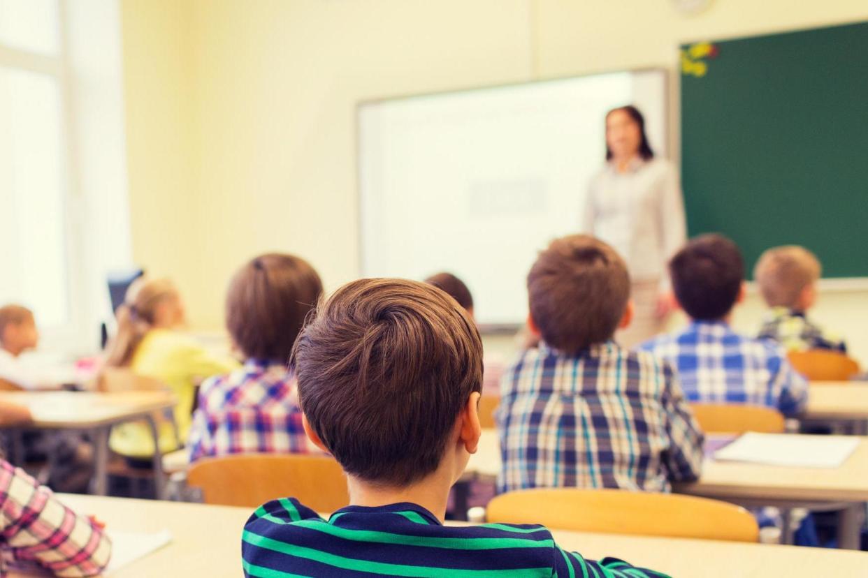 The children were allegedly told by teachers they could no longer socialise with their classmate (Stock image): dolgachov/iStock