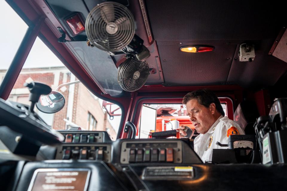 Hackensack Fire Chief Thomas Freeman gives his last dispatch as he retires after 40 years. People gather at the Hackensack Fire Department headquarters to see Freeman off on Friday, September 29, 2023.