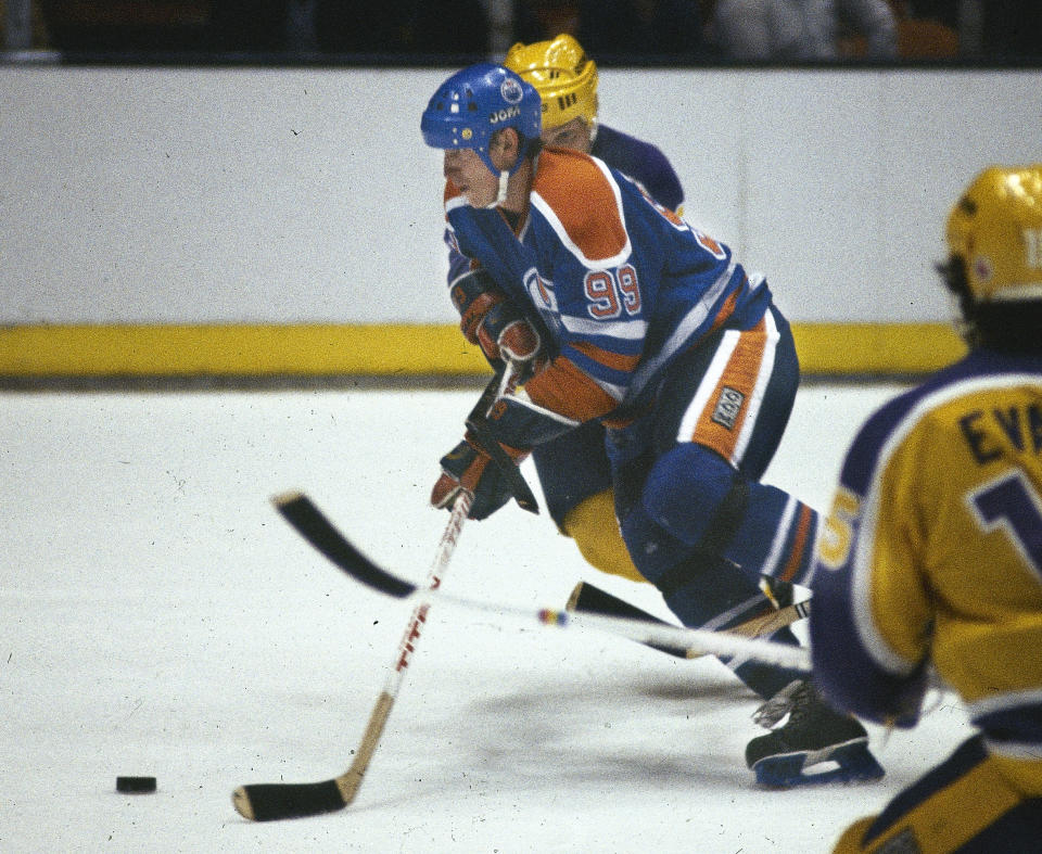Edmonton Oilers&#39; center forward Wayne Gretzky (99) is seen in action against the Los Angeles Kings, 1982.  (AP Photo)