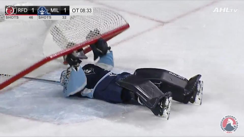 Nashville Predators goaltending prospect Yaroslav Askarov matched a big 45-save perfromance with an equally impressive celebration following the shootout win. (Photo via AHL/Twitter)