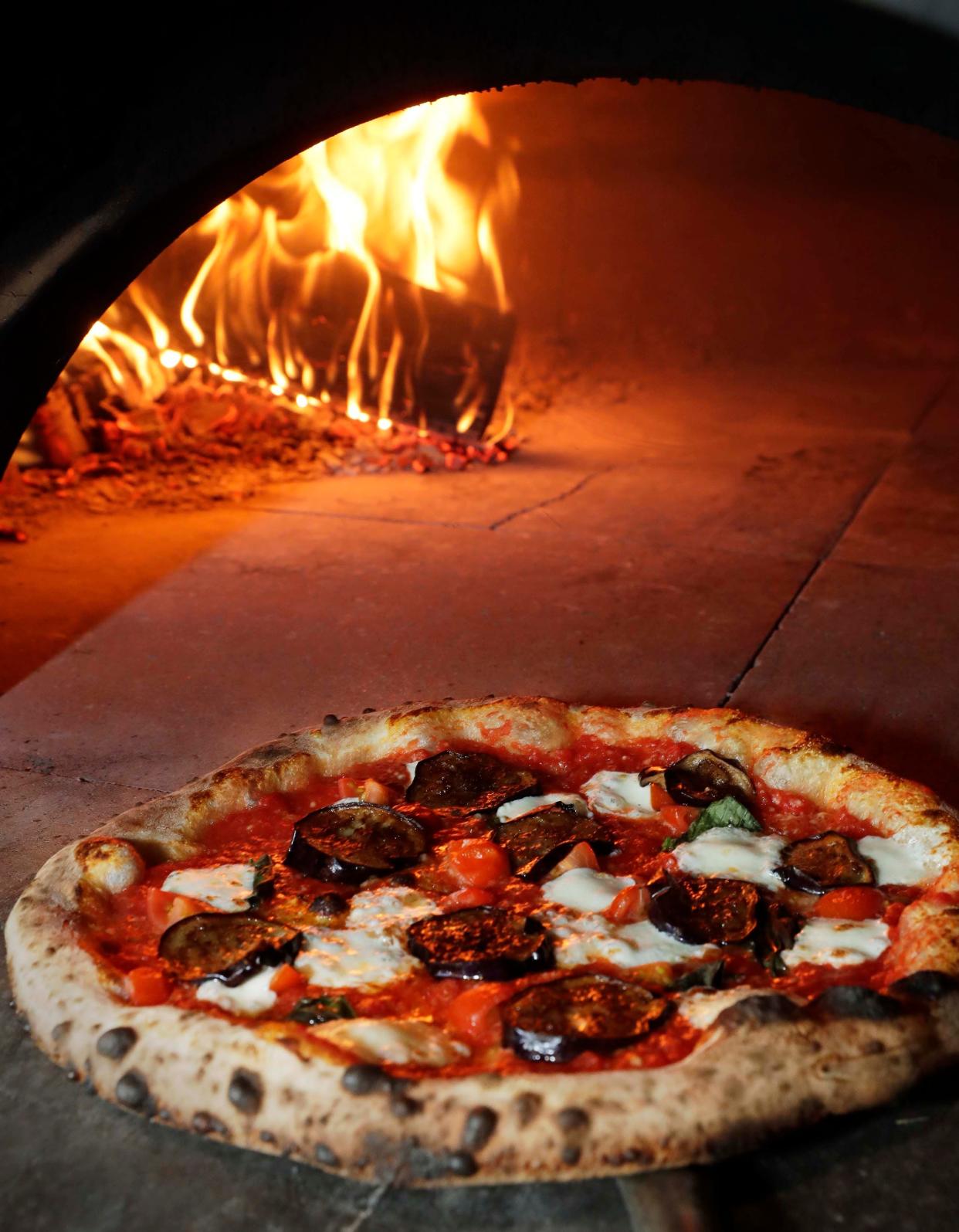 Sorella makes Neapolitan-style pizzas in its wood-fired oven. The Norma is a play on the Sicilian dish pasta alla Norma, topping the crust with eggplant, basil, mozzarella and ricotta salata.