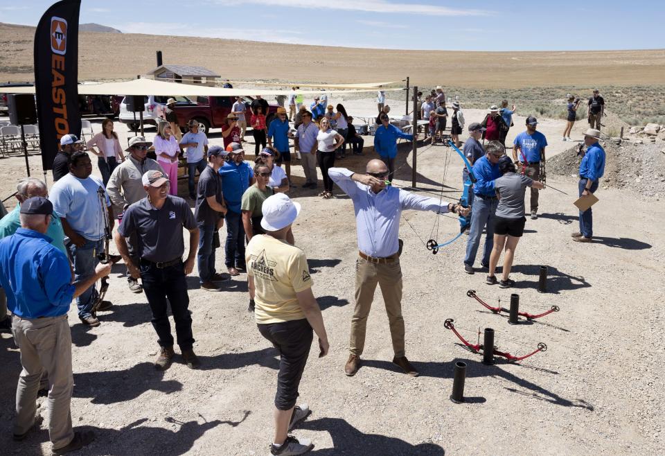People participate in an archery “fun shoot” at Antelope Island State Park in Syracuse on Wednesday, July 19, 2023. | Laura Seitz, Deseret News