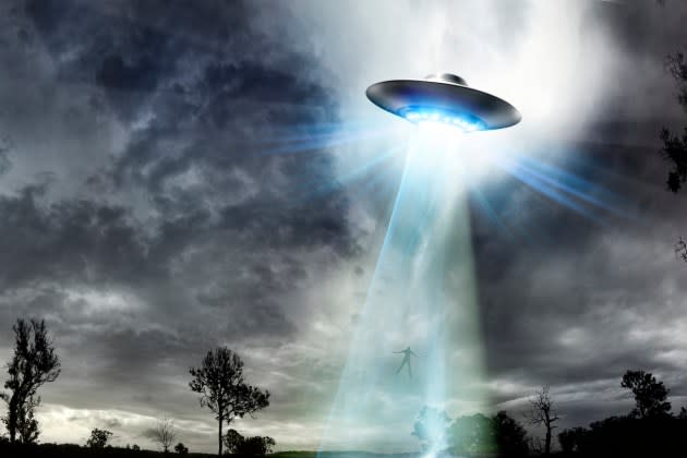 UFO Beaming up a Man - Credit: Getty Images