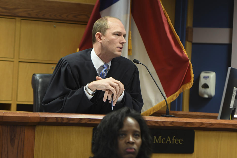 Judge Scott McAfee addresses the lawyers during a hearing on charges against former President Donald Trump in the Georgia election interference case on Thursday, March 28, 2024 in Atlanta. Lawyers for Trump argued in a court filing that the charges against him in the Georgia election interference case seek to criminalize political speech and advocacy conduct that is protected by the First Amendment. (Dennis Byron/Hip Hop Enquirer via AP)