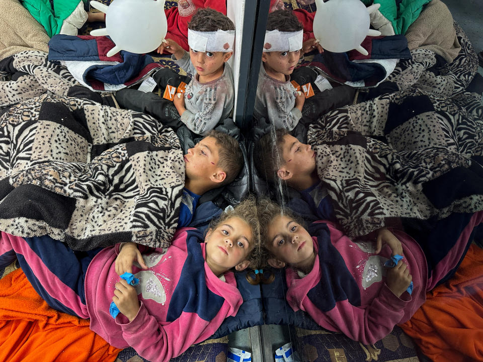 Palestinian children wounded in an Israeli strike rest as they receive treatment at a hospital, amid the ongoing conflict between Israel and the Palestinian Islamist group Hamas, in Rafah in the southern Gaza Strip, February 12, 2024. REUTERS/Mohammed Salem     TPX IMAGES OF THE DAY