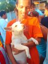 A pet owner from Malabon and his dog were among the recipients of relief from the PAWS team