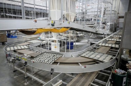 Trays with dough move on an automated line towards the oven during the production process at the Gonnella Baking Company in Aurora, Illinois, U.S., November 16, 2017. Picture taken November 16, 2017. REUTERS/Kamil Krzaczynski