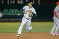 May 7, 2019; Oakland, CA, USA; Oakland Athletics right fielder Stephen Piscotty (25) runs against the Cincinnati Reds during the second inning at Oakland Coliseum. Mandatory Credit: Stan Szeto-USA TODAY Sports