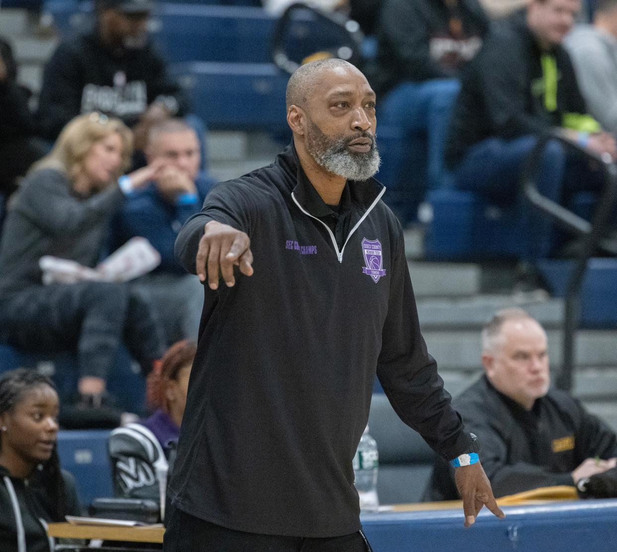 Newark Coach Margues Bragg send in instruction during game. College Achieve Asbury Park vs Newark Tech for NJSIAA Group 1 Title inToms River, NJ on March 10, 2024.