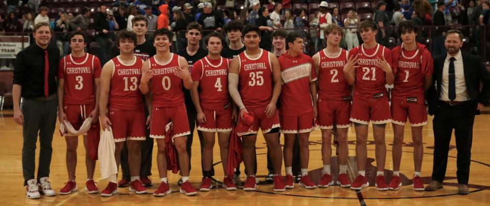 The Christoval High School Cougars celebrate after beating Coleman in a Class 2A boys basketball regional quarterfinal in Bronte on Tuesday, March 1, 2022.