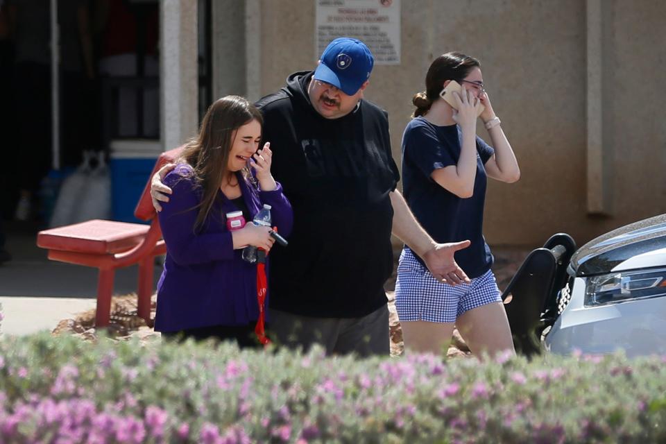 In El Paso in 2019, people arrived at MacArthur Elementary looking for family and friends during the aftermath of a shooting at the Walmart near Cielo Vista Mall on Saturday, Aug. 3, in El Paso. The school was being used a re-unification center.