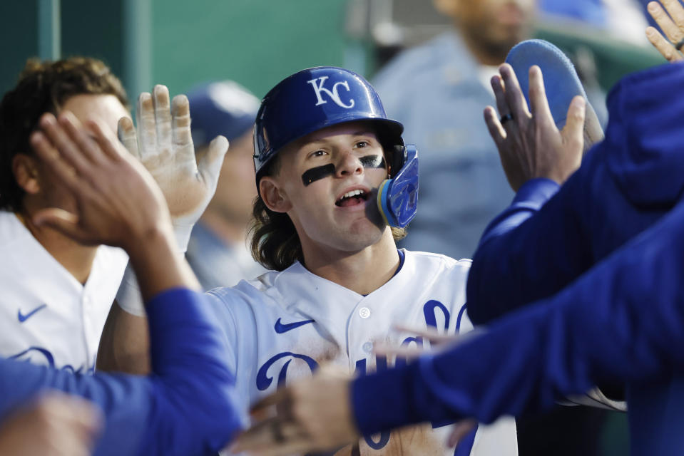 Kansas City Royals' Bobby Witt Jr. celebrates in the dugout after scoring off a Vinnie Pasquantino double during the seventh inning of a baseball game against the Baltimore Orioles in Kansas City, Mo., Wednesday, May 3, 2023. (AP Photo/Colin E. Braley)