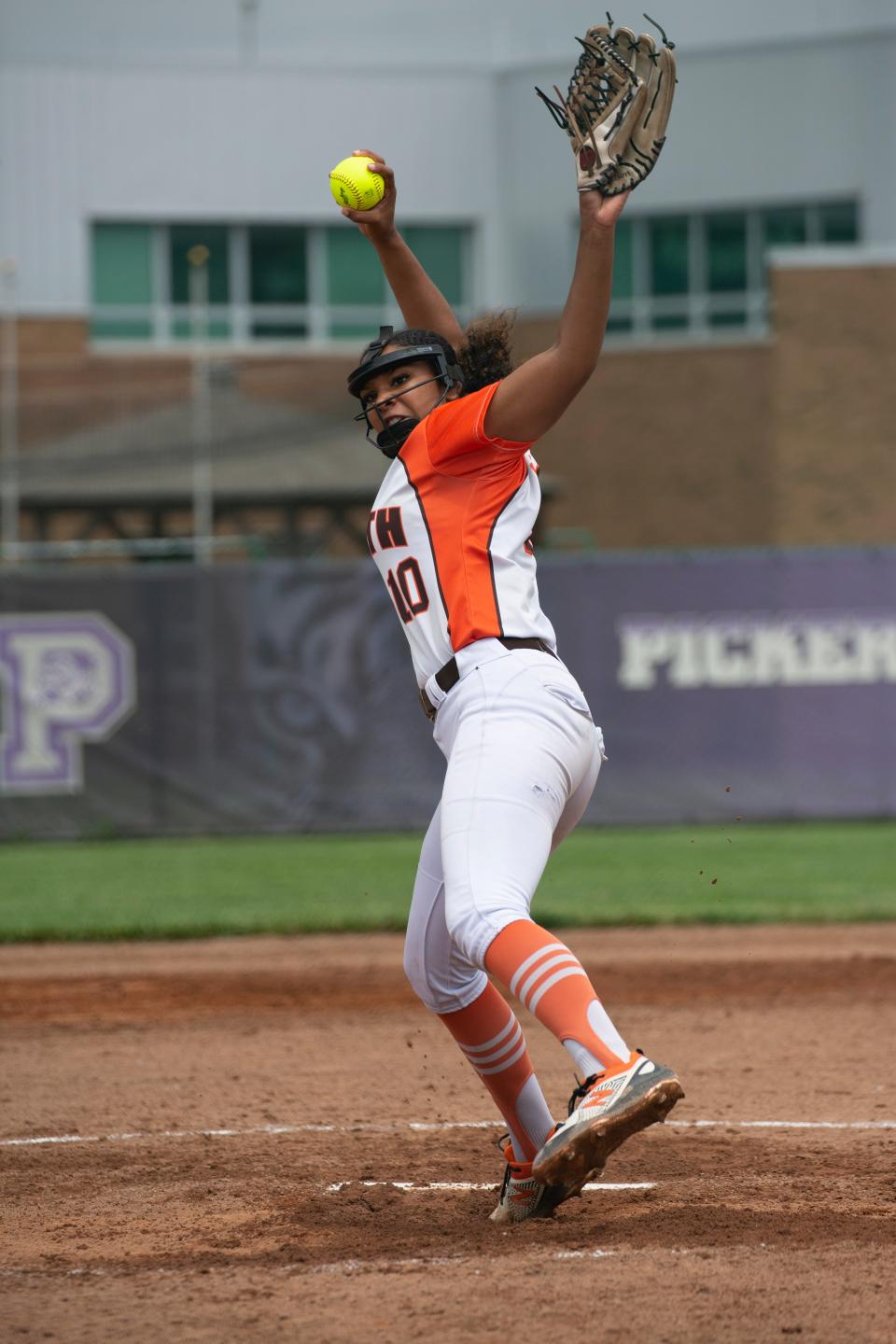 Heath junior Renae Cunningham pitches against John Glenn during the Division II regional finals at Pickerington Central.