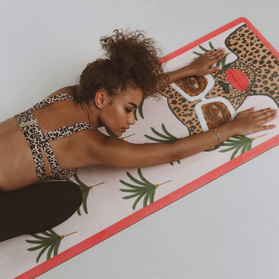 <p>This soft and beautiful yoga mat from Sugarmat features<a href="https://www.instagram.com/theebouffants/?hl=en" rel="nofollow noopener" target="_blank" data-ylk="slk:Kendra Dandy's vibrant artwork;elm:context_link;itc:0;sec:content-canvas" class="link "> Kendra Dandy's vibrant artwork</a>. </p> <p>The synthetic suede mat comes with a matching face mask and a display-worthy case. In addition, 40% of proceeds from the <a href="https://www.sugarmat.com/collections/sassy-collection" rel="nofollow noopener" target="_blank" data-ylk="slk:Sassy Collection;elm:context_link;itc:0;sec:content-canvas" class="link ">Sassy Collection</a> will be donated directly to the <a href="https://secure.actblue.com/donate/ms_blm_homepage_2019" rel="nofollow noopener" target="_blank" data-ylk="slk:Black Lives Matter movement;elm:context_link;itc:0;sec:content-canvas" class="link ">Black Lives Matter movement</a>. The collection also includes yoga blocks, straps, and workout clothing.</p> <p><a href="https://www.sugarmat.com/collections/sassy-collection/products/kiss-make-up-mat-suede-yoga-mat-3mm" rel="sponsored noopener" target="_blank" data-ylk="slk:Sugarmat featuring Kendra Dandy, $89;elm:context_link;itc:0;sec:content-canvas" class="link ">Sugarmat featuring Kendra Dandy, $89</a></p>