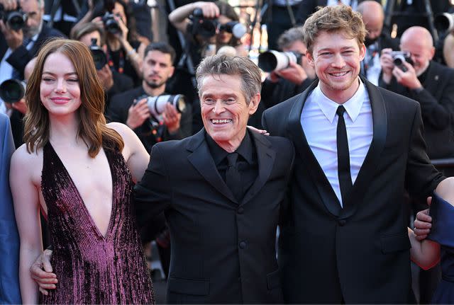 <p>Kristy Sparow/Getty</p> Emma Stone, Willem Dafoe and Joe Alwyn