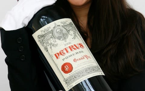 Chateau Petrus was among the signatories of a warning that France risked losing its 'soul' if bigger health warnings were slapped on wine bottles - Credit: Akira Suemori/AP