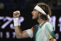 Stefanos Tsitsipas of Greece reacts after winning a point against Jannik Sinner of Italy during their quarterfinal the Australian Open tennis championships in Melbourne, Australia, Wednesday, Jan. 26, 2022. (AP Photo/Andy Brownbill)