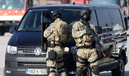 Participants of the European Union Force (EUFOR), Armed Forces, Border Police and State Investigation and Protection Agency (SIPA) of Bosnia and Herzegovina practice an anti-terrorism situation during an exercise at the Sarajevo International Airport, Bosnia and Herzegovina October 13, 2017. REUTERS/Dado Ruvic