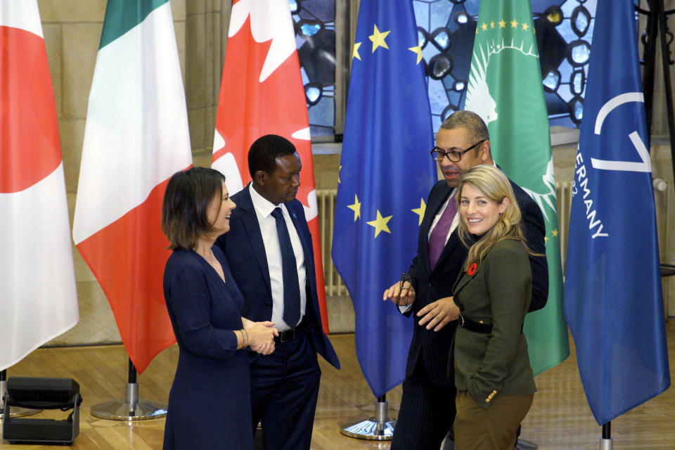 From left to right, German Foreign Minister Annalena Baerbock, Foreign Minister of the Republic of Kenya Alfred Mutua, British Foreign Minister James Cleverly and Canadian Foreign Minister Melanie Joly talk during a session at the Historic Town Hall during the G7 Foreign Ministers Meeting in Muenster, Germany, Friday, Nov. 4, 2022. (Bernd Lauter/Pool Photo via AP)