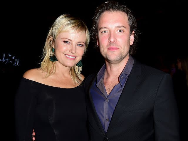 <p>Vivien Killilea/Getty</p> Malin Akerman and her husband Jack Donnelly attend the AdoptTogether Baby Ball 2022 on October 15, 2022 in Studio City, California.