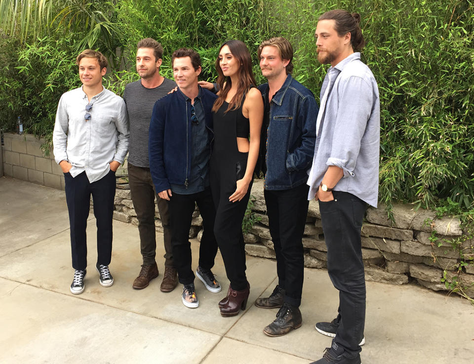 <p>Finn Cole, Scott Speedman, Shawn Hatosy, Carolina Guerra, Jake Weary, and Ben Robson pose for pictures before the <em>Animal Kingdom</em> ‘Tacos and Tequila’ Event on May 15, 2017 in Burbank, Calif. (Photo: Giana Mucci/Yahoo) </p>