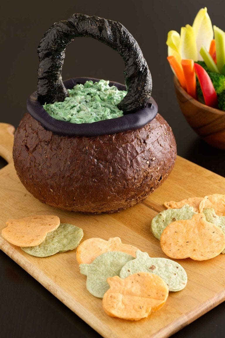 Spooky Spinach Dip in Bread Bowl Cauldron
