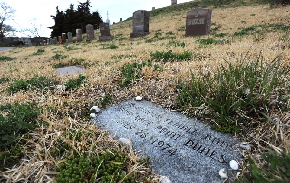 The remains of the unidentified woman known as the Lady of the Dunes is buried in St. Peter's cemetery in Provincetown. The woman's identity, Ruth Marie Terry, was revealed by law enforcement authorities on Oct. 31, 2022.