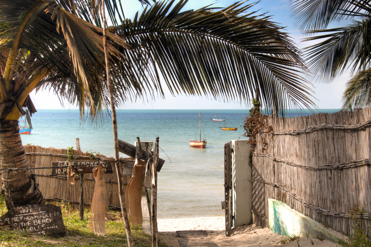 Gate of a Guest House Opened Revealing the Beach, Vilanculos, Mozambique