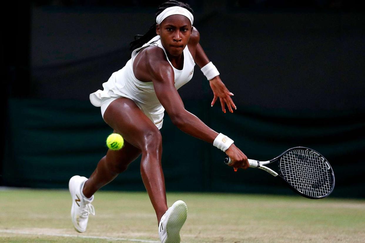 <p>ADRIAN DENNIS/AFP via Getty Images</p> Coco Gauff during the 2019 Wimbledon Championships.