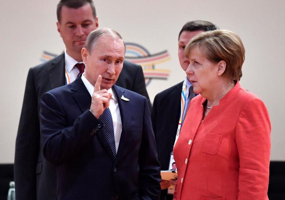 Merkel and Vladimir Putin at a G20 meeting in Hamburg in July 2017